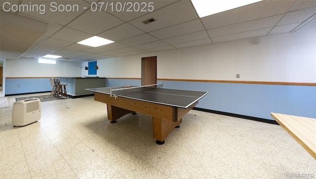 2150 Dunwoodie St, Ortonville, MI 48462 - playroom featuring tile patterned floors and a paneled ceiling