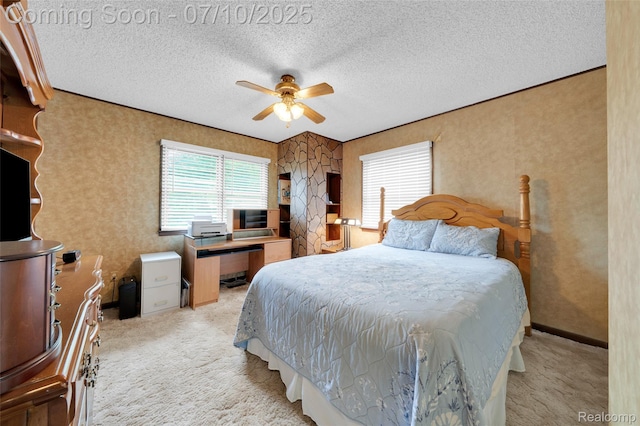 2150 Dunwoodie St, Ortonville, MI 48462 - carpeted bedroom featuring multiple windows, a textured ceiling, and a ceiling fan