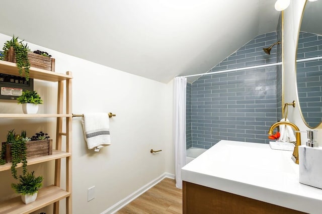 5544 Balfour Rd, Detroit, MI 48224 - full bath featuring lofted ceiling, wood finished floors, shower / bath combination with curtain, and vanity