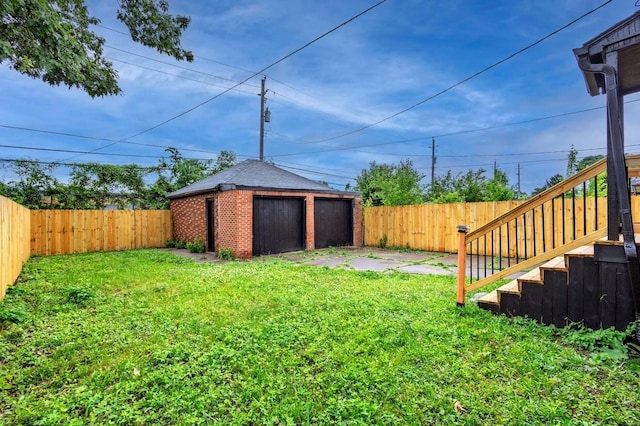 5544 Balfour Rd, Detroit, MI 48224 - fenced backyard with an outbuilding and stairway
