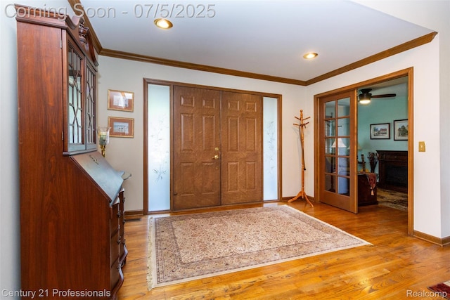 6626 Lake Pointe, Shelby Twp, MI 48317 - foyer featuring wood finished floors, crown molding, recessed lighting, and french doors