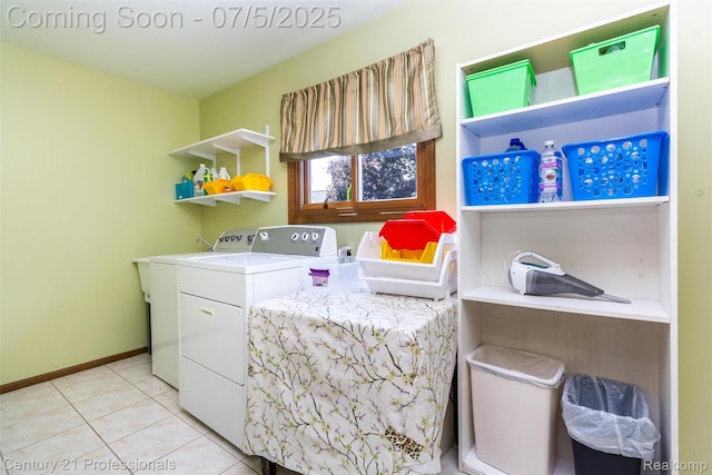 6626 Lake Pointe, Shelby Twp, MI 48317 - laundry area with washer and dryer and light tile patterned floors