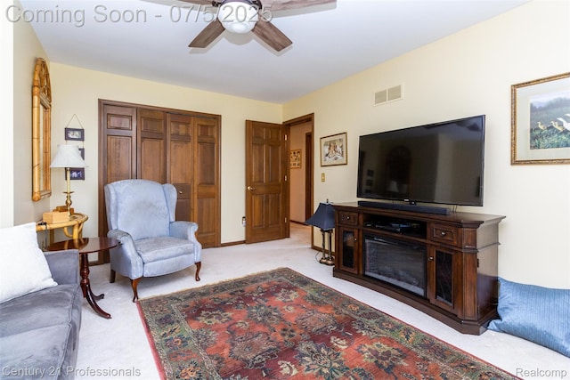 6626 Lake Pointe, Shelby Twp, MI 48317 - living room featuring a ceiling fan and carpet
