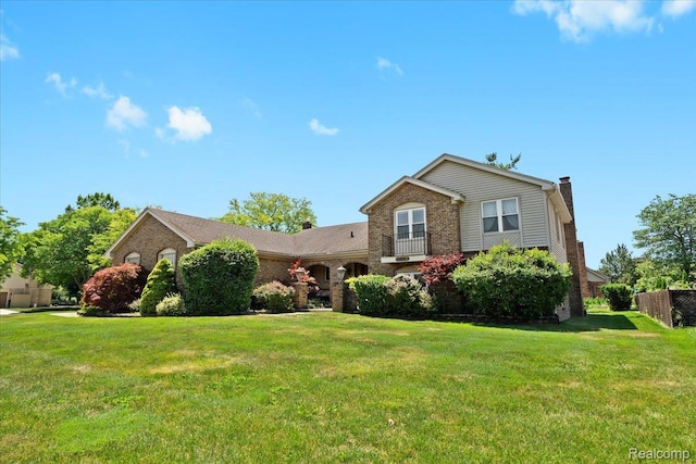 20213 Whitby Dr, Livonia, MI 48152 - tri-level home featuring a chimney and brick siding
