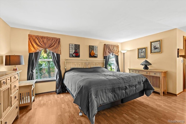 20213 Whitby Dr, Livonia, MI 48152 - bedroom featuring wood finished floors and baseboards