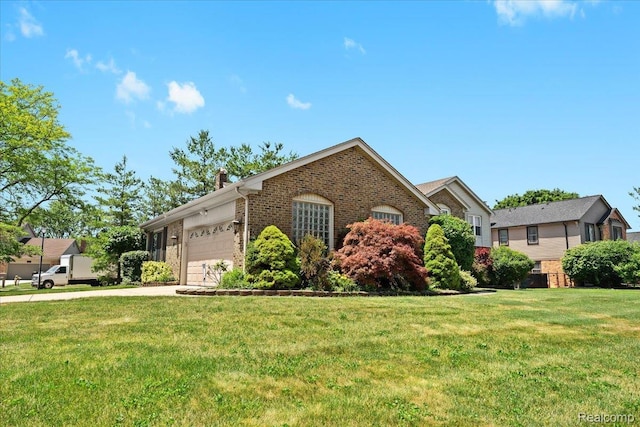 20213 Whitby Dr, Livonia, MI 48152 - ranch-style house featuring brick siding, an attached garage, a front yard, and a chimney