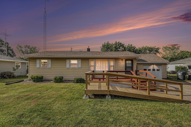 981 Vinewood Dr, Saint Joseph, MI 49085 - back of house at dusk featuring a yard and a deck