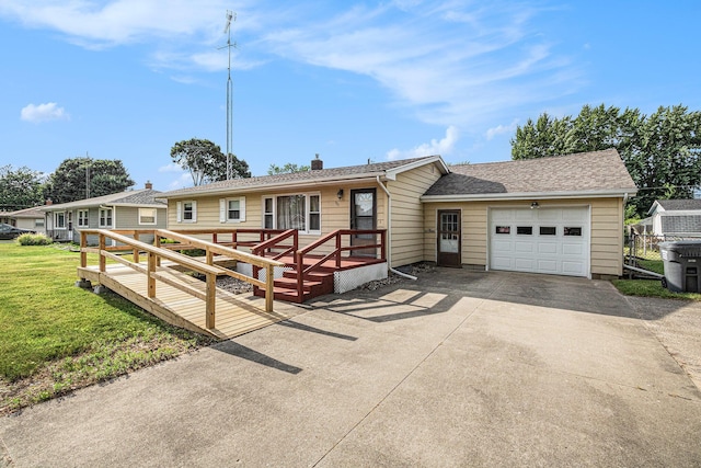 981 Vinewood Dr, Saint Joseph, MI 49085 - single story home with a garage, driveway, a front yard, and a chimney