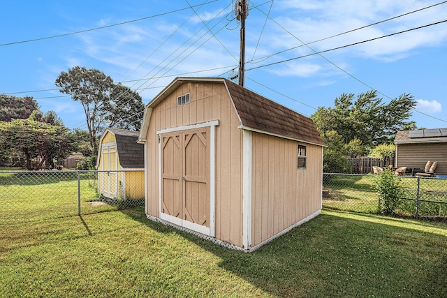 981 Vinewood Dr, Saint Joseph, MI 49085 - view of shed featuring a fenced backyard