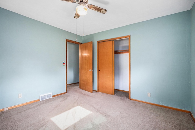 981 Vinewood Dr, Saint Joseph, MI 49085 - unfurnished bedroom featuring carpet, a closet, and a ceiling fan