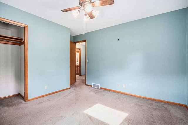 981 Vinewood Dr, Saint Joseph, MI 49085 - unfurnished bedroom with carpet floors, a closet, and ceiling fan