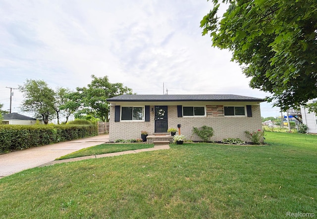 8220 Rivard Ave, Warren, MI 48089 - ranch-style house with a front lawn and brick siding