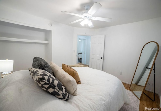 8220 Rivard Ave, Warren, MI 48089 - bedroom with wood finished floors and ceiling fan
