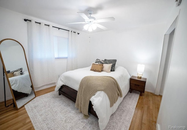 8220 Rivard Ave, Warren, MI 48089 - bedroom with light wood-style flooring and a ceiling fan