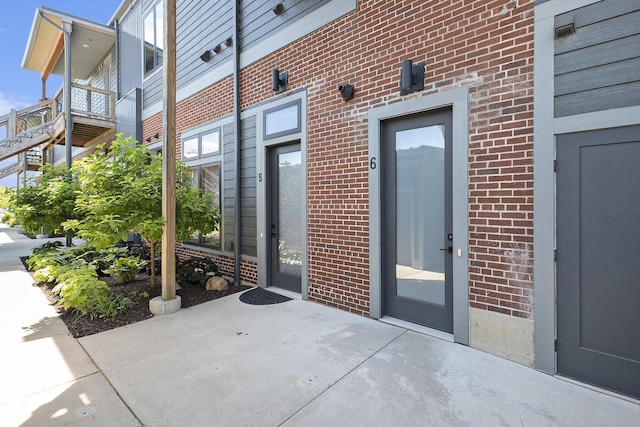 220 King St Unit 6, Lowell, MI 49331 - entrance to property with brick siding
