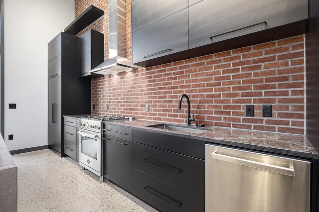 220 King St Unit 6, Lowell, MI 49331 - kitchen with appliances with stainless steel finishes, wall chimney exhaust hood, dark aggregate flooring, and modern cabinets