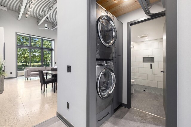 220 King St Unit 6, Lowell, MI 49331 - washroom featuring stacked washer and clothes dryer and ceiling fan