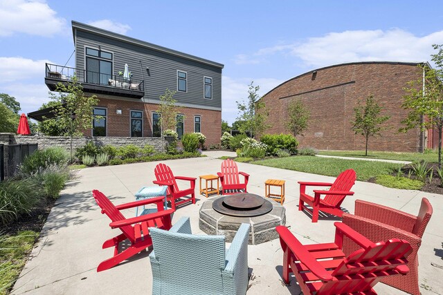 220 King St Unit 6, Lowell, MI 49331 - patio / terrace featuring a fire pit and a patio
