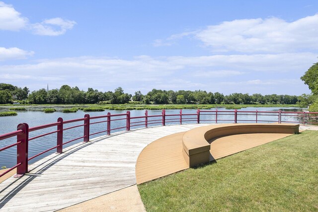 220 King St Unit 6, Lowell, MI 49331 - dock area with a water view and a lawn