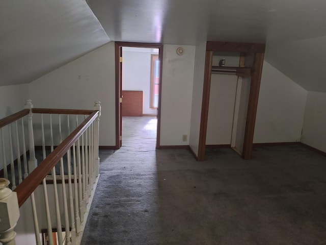 203 E Home St, Edmore, MI 48829 - additional living space with lofted ceiling and carpet