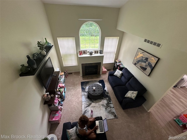 38351 Churchill, Farmington Hills, MI 48331 - living area with carpet flooring and a tiled fireplace