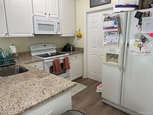 38351 Churchill, Farmington Hills, MI 48331 - kitchen featuring white appliances, white cabinets, dark wood finished floors, and light stone countertops