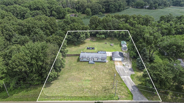 2919 N US Highway 31, Niles, MI 49120 - aerial view of property and surrounding area with property boundaries highlighted and a heavily wooded area