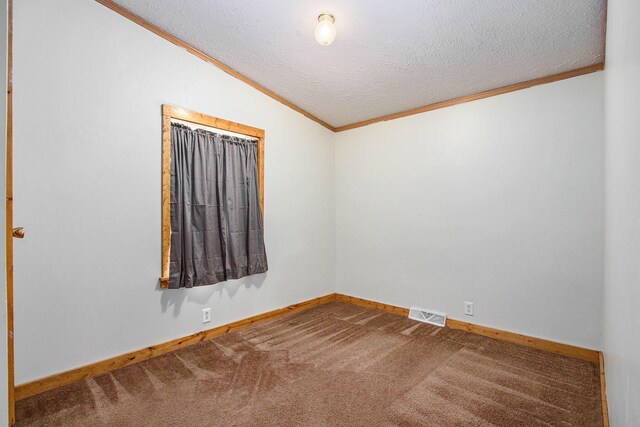 2919 N US Highway 31, Niles, MI 49120 - unfurnished room featuring ornamental molding, carpet, and a textured ceiling