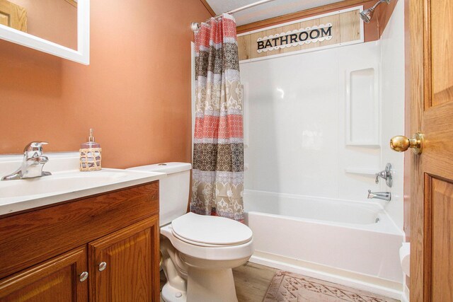 2919 N US Highway 31, Niles, MI 49120 - full bathroom with vanity, shower / bathtub combination with curtain, and wood finished floors