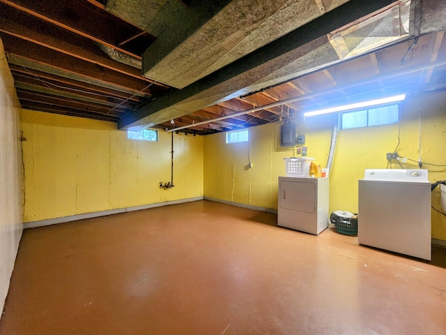 671 Lonesome Pine Trl, Saint Joseph, MI 49085 - basement featuring independent washer and dryer, electric panel, and healthy amount of natural light