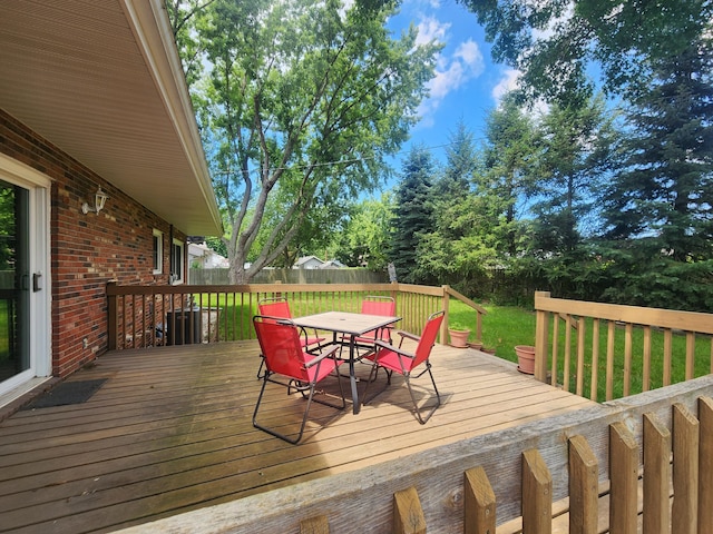 671 Lonesome Pine Trl, Saint Joseph, MI 49085 - wooden deck with outdoor dining space