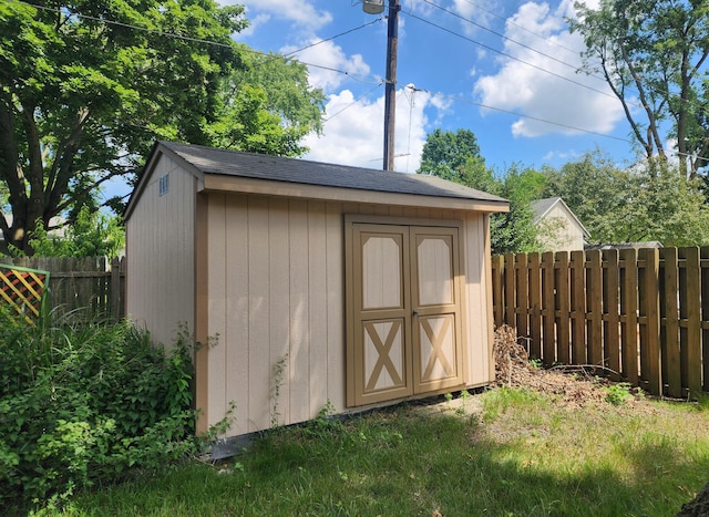 671 Lonesome Pine Trl, Saint Joseph, MI 49085 - view of shed with a fenced backyard
