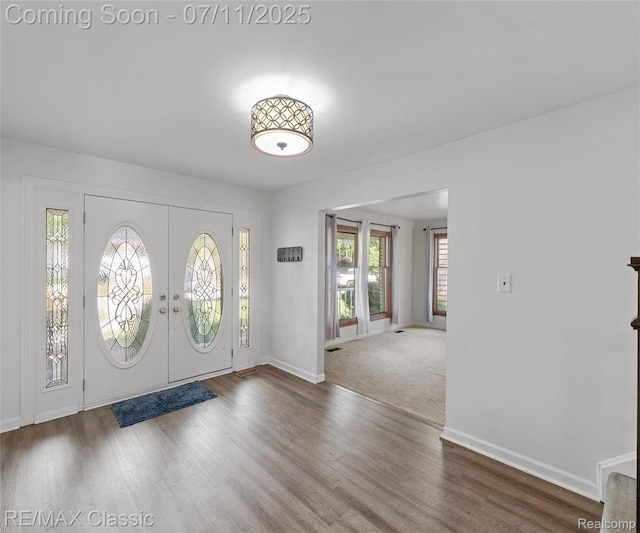 25067 Skye Dr, Farmington Hills, MI 48336 - foyer with wood finished floors and baseboards