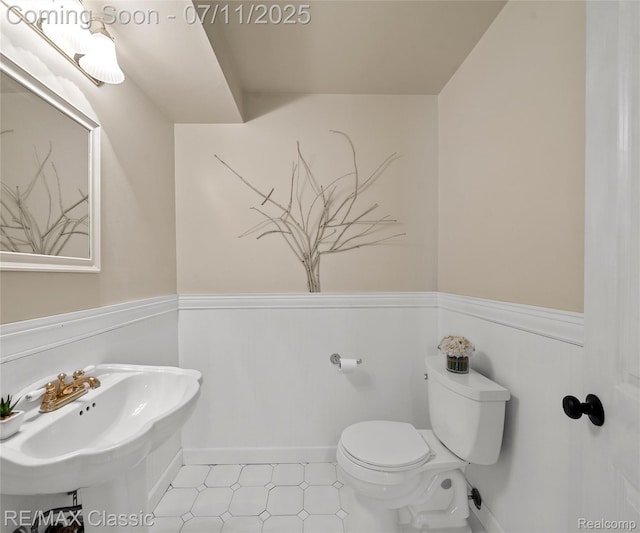 25067 Skye Dr, Farmington Hills, MI 48336 - half bathroom with toilet and a wainscoted wall