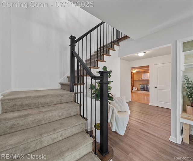 25067 Skye Dr, Farmington Hills, MI 48336 - stairs with wood finished floors and baseboards