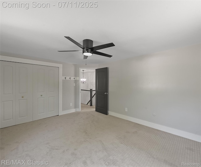 25067 Skye Dr, Farmington Hills, MI 48336 - unfurnished bedroom with carpet, a closet, and ceiling fan