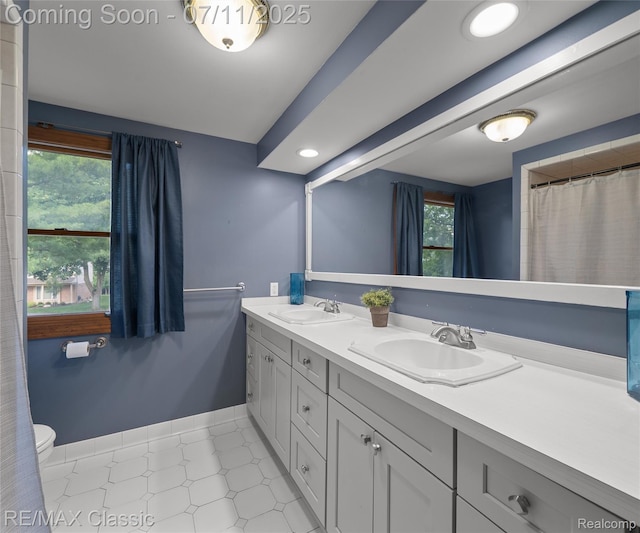 25067 Skye Dr, Farmington Hills, MI 48336 - full bath with double vanity and plenty of natural light