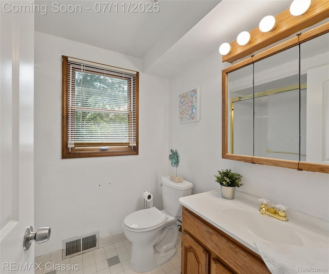 25067 Skye Dr, Farmington Hills, MI 48336 - bathroom featuring vanity, a stall shower, and tile patterned flooring