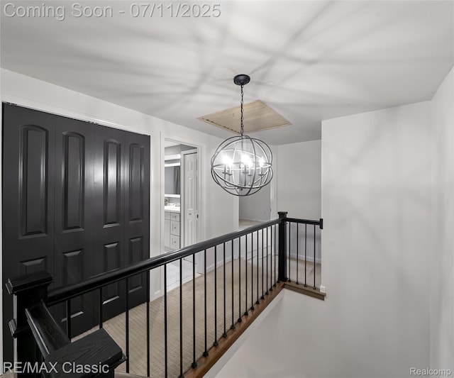 25067 Skye Dr, Farmington Hills, MI 48336 - corridor featuring a chandelier and an upstairs landing
