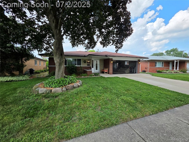 12137 Carol Ave, Warren, MI 48093 - ranch-style home featuring brick siding, a garage, driveway, and a front yard