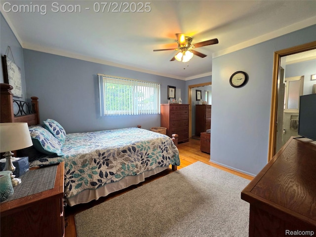 12137 Carol Ave, Warren, MI 48093 - bedroom with ornamental molding, wood finished floors, and a ceiling fan