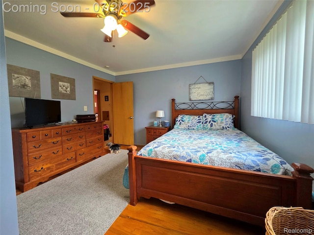 12137 Carol Ave, Warren, MI 48093 - bedroom with ornamental molding, ceiling fan, and wood finished floors