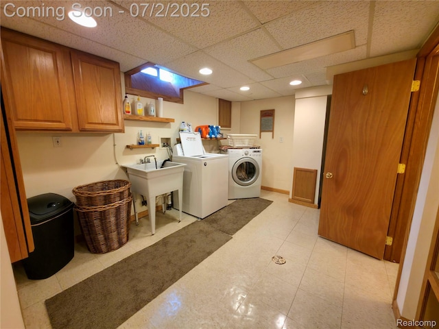 12137 Carol Ave, Warren, MI 48093 - washroom featuring cabinet space, washer and dryer, and recessed lighting
