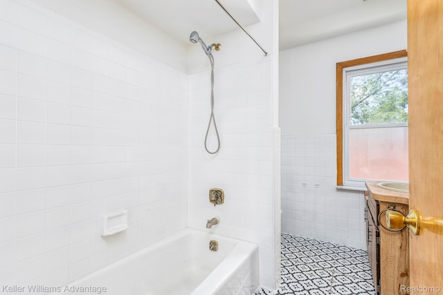 17237 Philomene Blvd, Allen Park, MI 48101 - full bath with vanity, tile walls, tub / shower combination, wainscoting, and tile patterned floors