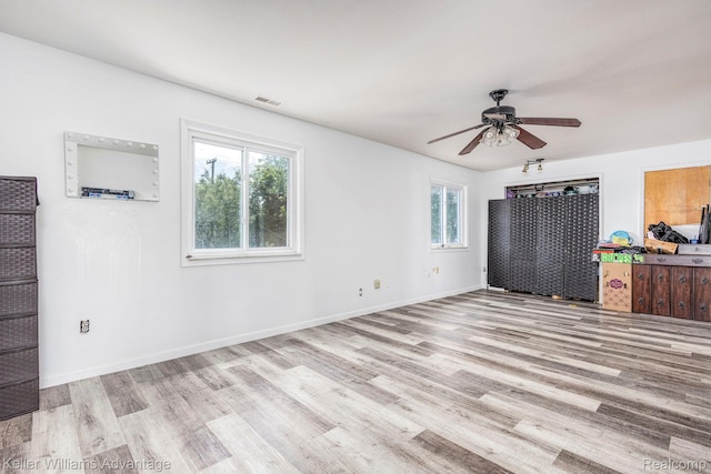 17237 Philomene Blvd, Allen Park, MI 48101 - unfurnished living room featuring wood finished floors and a ceiling fan
