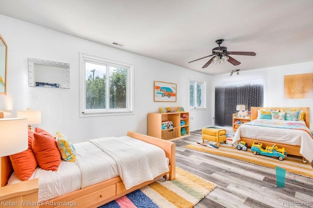 17237 Philomene Blvd, Allen Park, MI 48101 - bedroom featuring wood finished floors and a ceiling fan