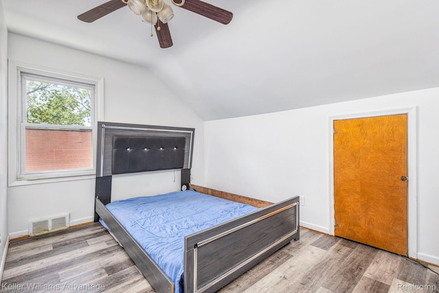 17237 Philomene Blvd, Allen Park, MI 48101 - bedroom with lofted ceiling, wood finished floors, and ceiling fan