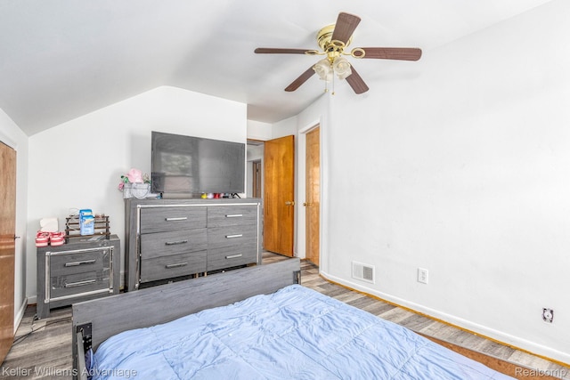 17237 Philomene Blvd, Allen Park, MI 48101 - bedroom featuring wood finished floors, lofted ceiling, and a ceiling fan