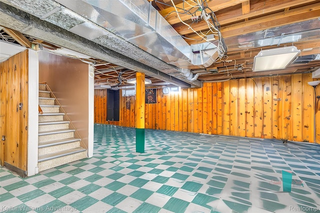 17237 Philomene Blvd, Allen Park, MI 48101 - basement featuring tile patterned floors, wooden walls, and stairway