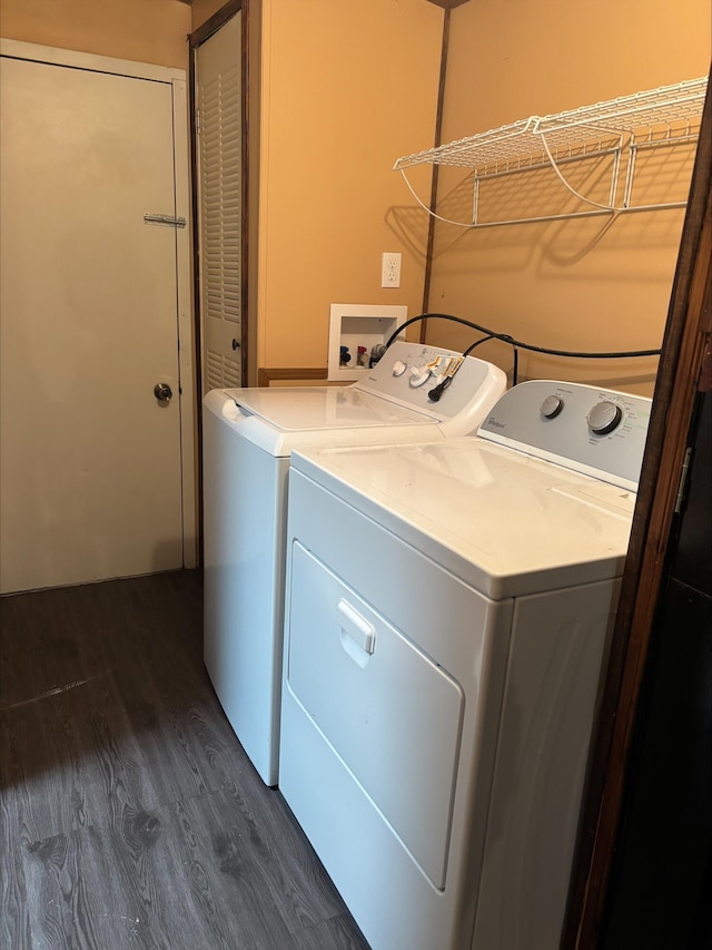 9670 Sayers Rd, Munith, MI 49259 - laundry room with separate washer and dryer and dark wood-style floors